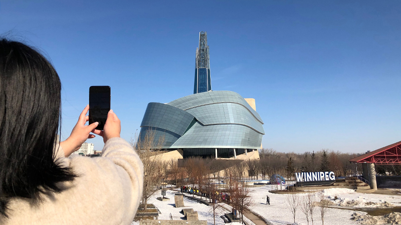 person-taking-phone-photo-of-CMHR.jpg (277 KB)